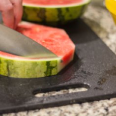 Cutting Rind off Watermelon