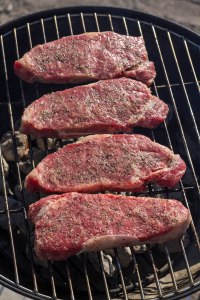 Lay the steaks perpendicular to the grill