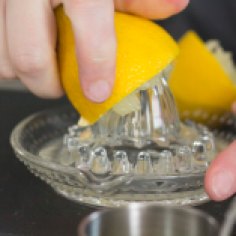 squeezing the juice from a lemon